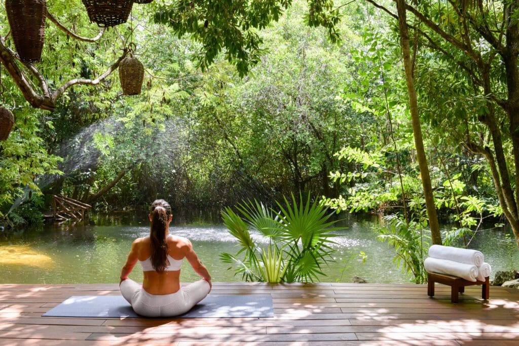 Yoga on the Spa Deck (Photo by Rosewood Mayakoba)