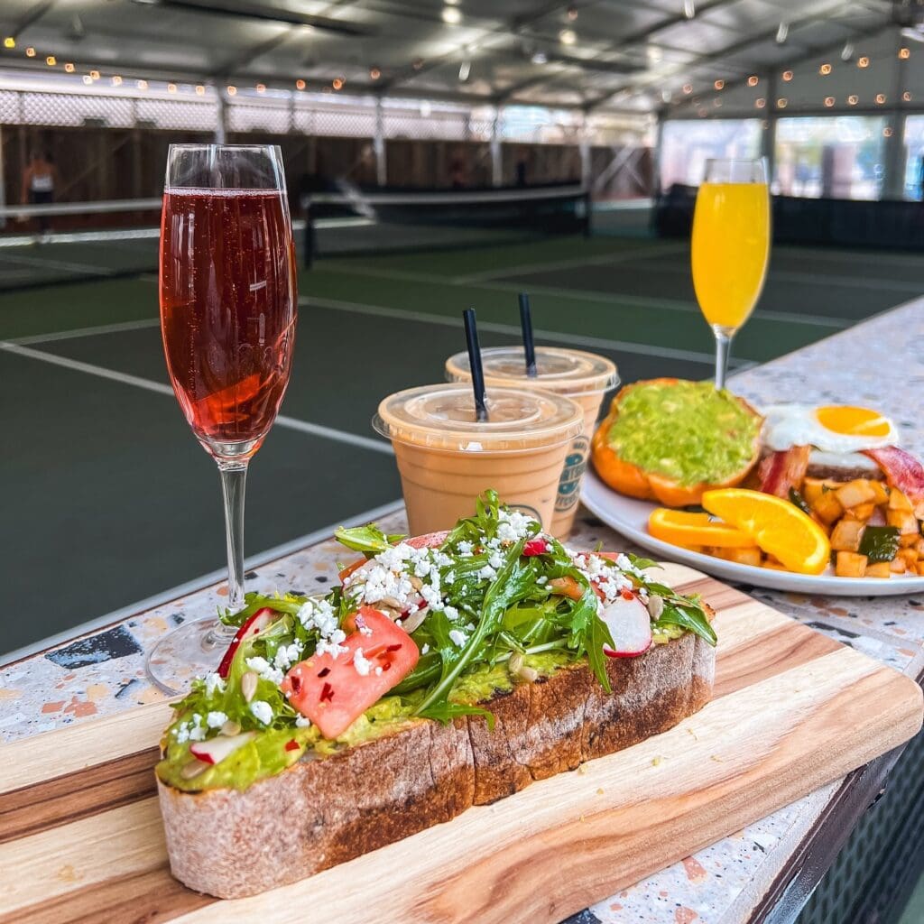 The open-air pickleball courts at Courtside Kitchen remain open as Chef Tim Love and his team relaunch the indoor restaurant as Meraki, a Mediterranean concept set to debut in February. 