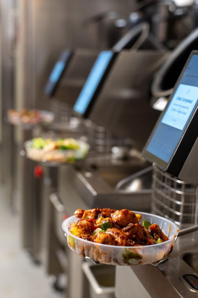 Robot Chefs Give Houston’s new iWok Restaurant a Futuristic Twist — Fast-Casual Asian Food That’s Tech Driven