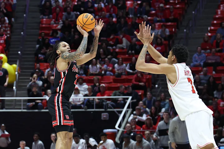 Emanuel Sharp just hitting threes against Utah, until he was in the all-time University of Houston record book.