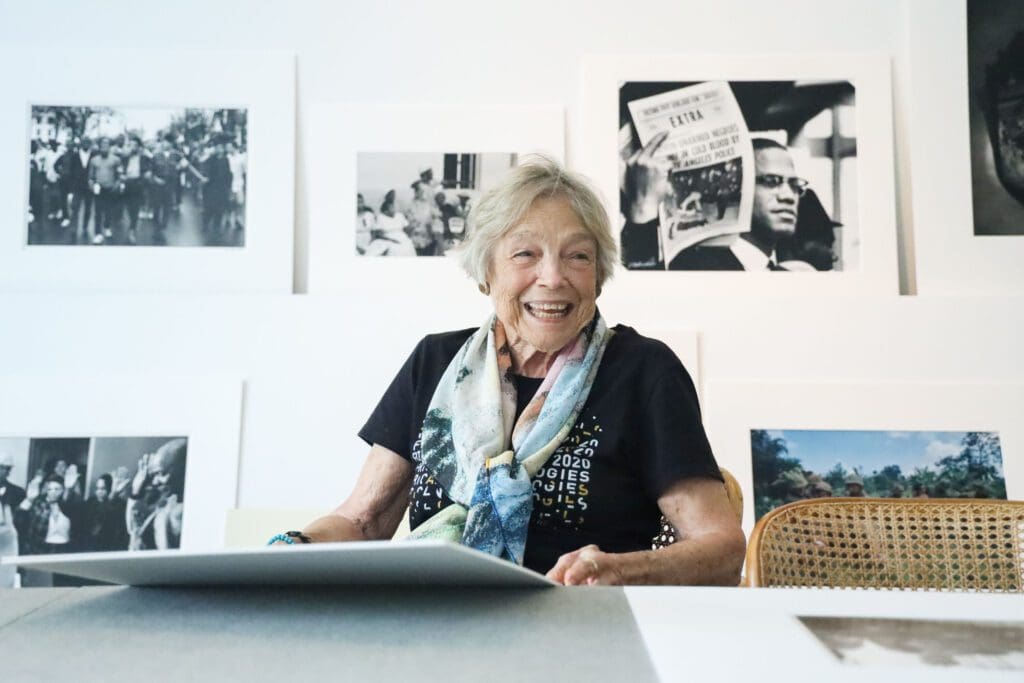 Wendy Watriss selecting images for “Photography from the Menil Collection: Curated by Wendy Watriss,” October 20, 2025. (Photo by Sarah Hobson)