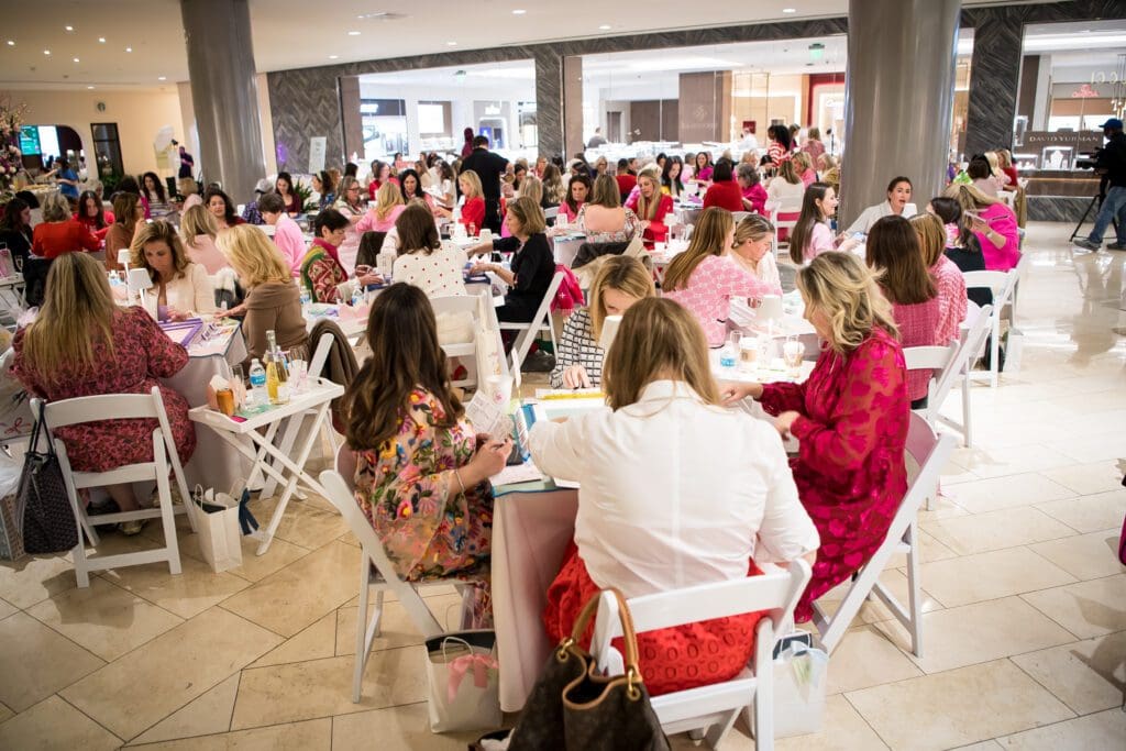 The event takes place in early February, and attendees are encouraged to dress to the nines in their girliest and swirliest Valentine's Day fits. (Photo by Kelly Alexander Photography)