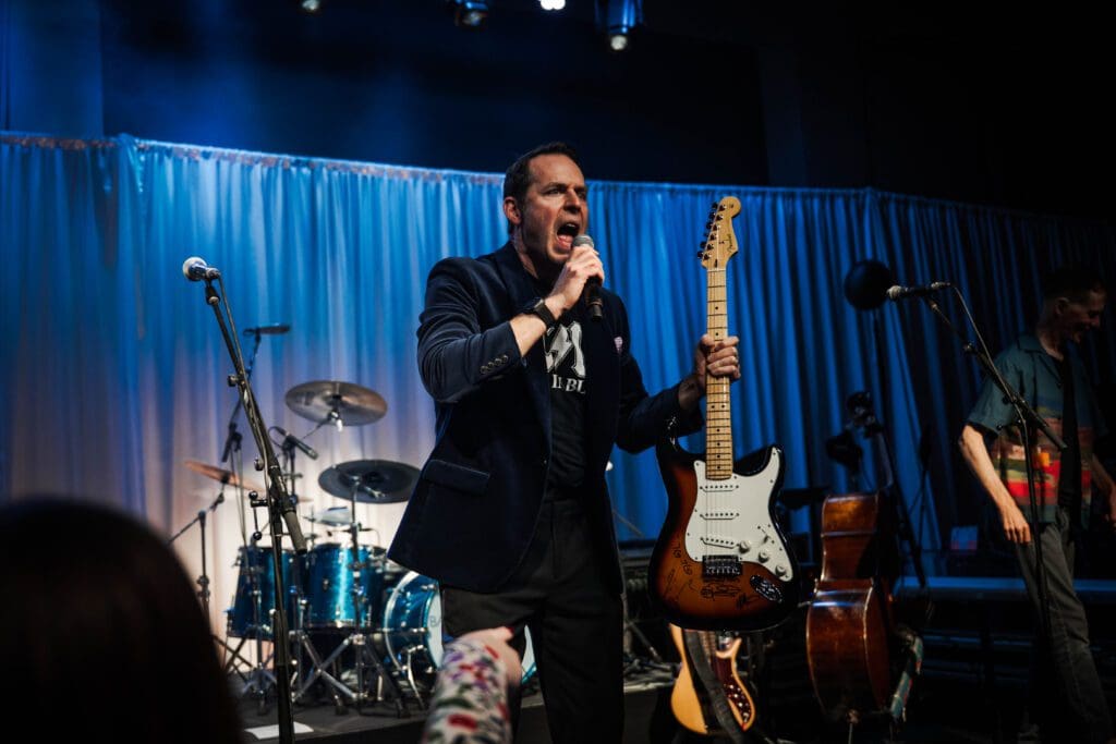 Vegas-High Stakes and Barenaked Ladies — A One-of-a-Kind Post Malone Guitar Drives Cynthia Woods’ $1.2 Million Night