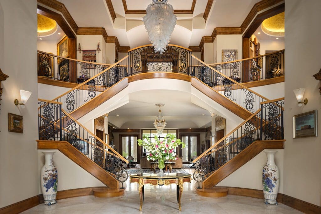 The grand entry with double staircase at 6 W. Rivercrest Drive which is on the market for $12.5 million (Photo by Laurie Perez)