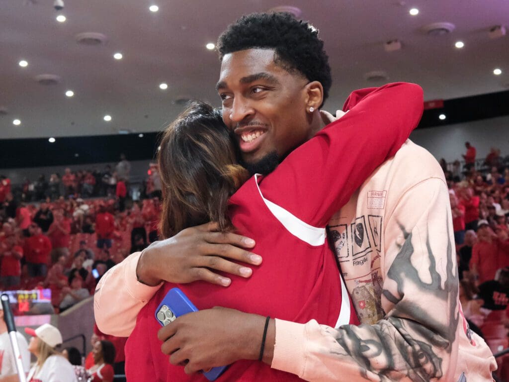 Former University of Houston center Ja'Vier Francis came back and got a huge hug from Lauren Sampson. (Photo by F. Carter Smith)