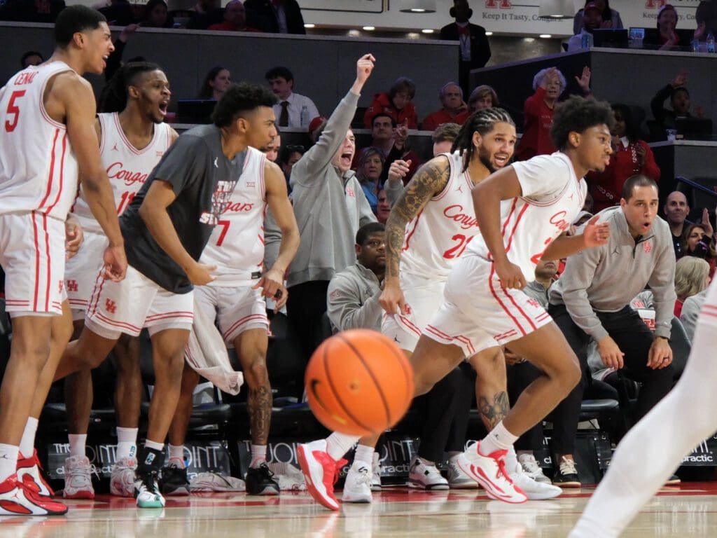 University of Houston's players enjoy each other's success and celebrate them — no matter who's on the court or the bench. (Photo by F. Carter Smith)