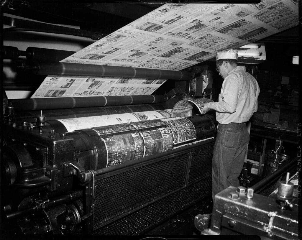 Charles “Teenie” Harris, "A Pittsburgh Courier Press Operator Printing Newspapers," 1954. (Courtesy of the Carnegie Museum of Art)
