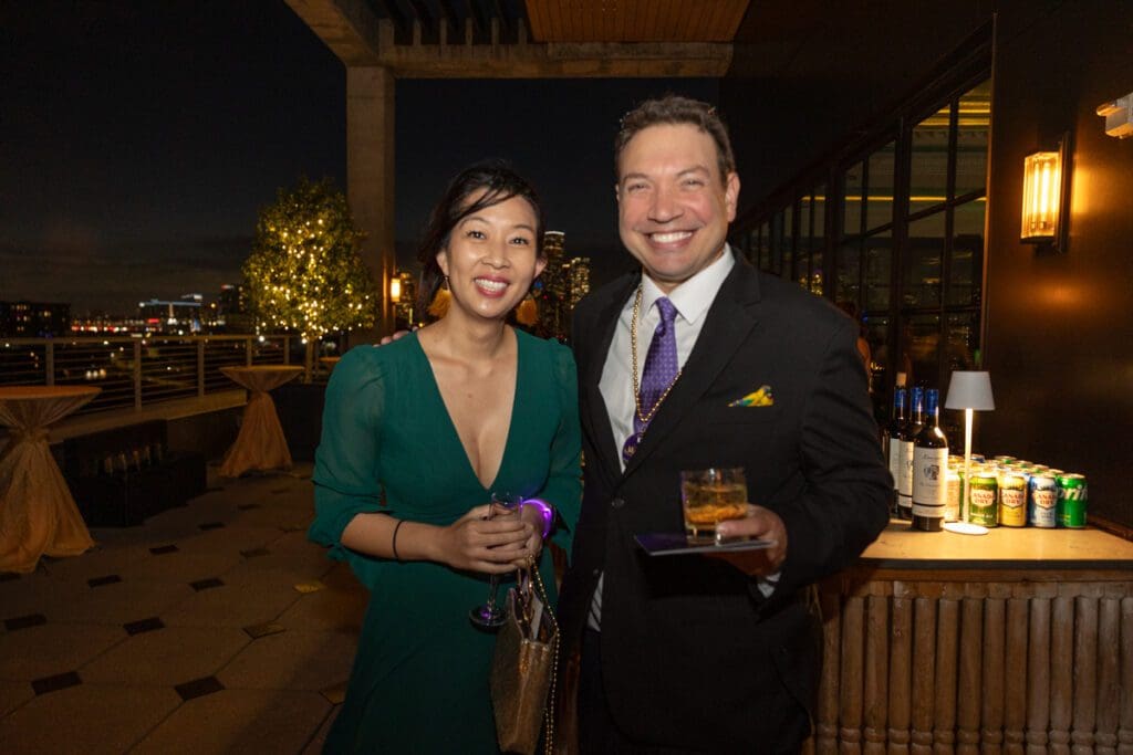 Iris Tian, Adam Lyons at LEAD's Mardi Gras soirée