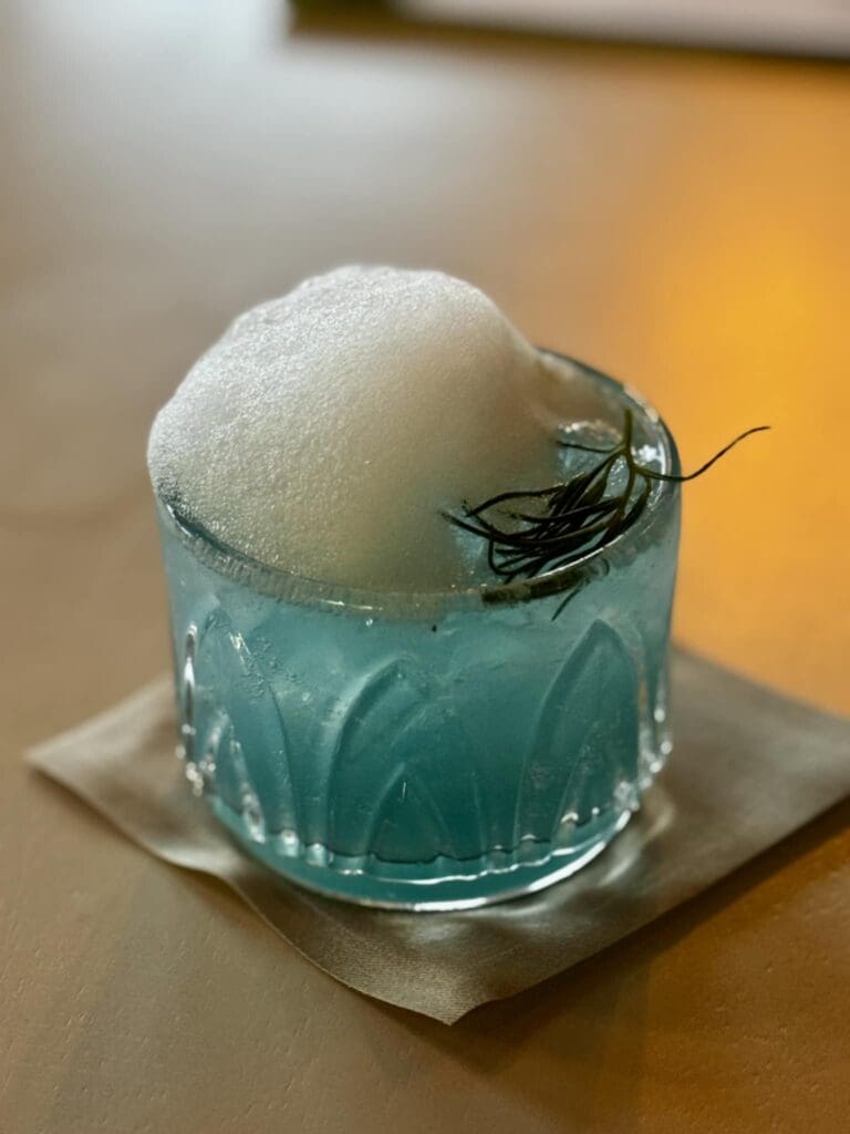As we perused the menu at Meraki, we tried a cocktail recommended by our waiter: Sea You In Santorini. (Courtesy)