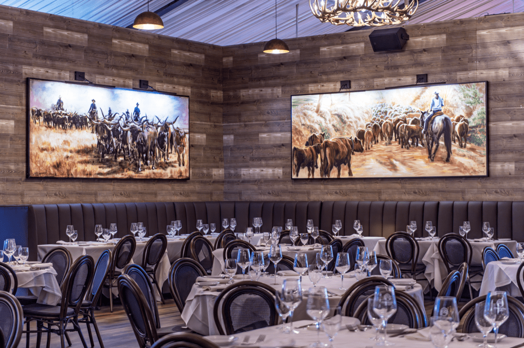 The main dining room at the 1932 Cattleman's Club is dressed in custom original paintings.  (Photo courtesy of Fertitta Entertainment) (Photo by Photo courtesy of Fertitta Entertainment)