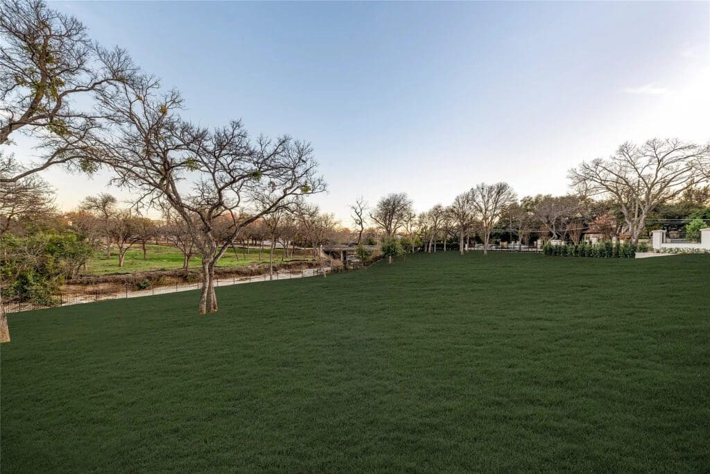 The California Transitional mansion sits on more than two expansive acres along Bachman Creek. (Photo by Allie Beth Allman & Associates)