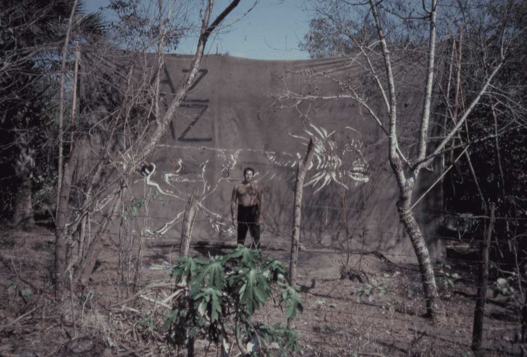 Julian Schnabel with "War (Mexican Painting)" in Zihuatanejo, Mexico 1986 (Photo by Pamela Barkentin)