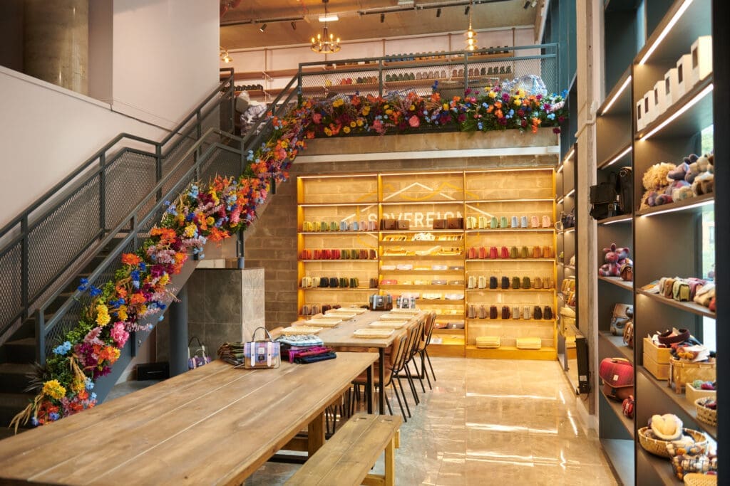 At Islander's Old Town workshop, visitors design and build their own bespoke Harris Tweed handbag — a hands-on encounter with one of Scotland's most iconic textiles.