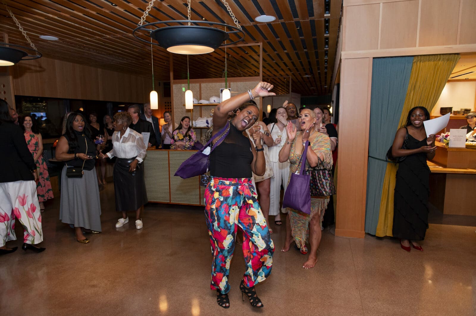 Errika Flood Moultrie wins raffle prize (Photo by Tamytha Cameron Photography)