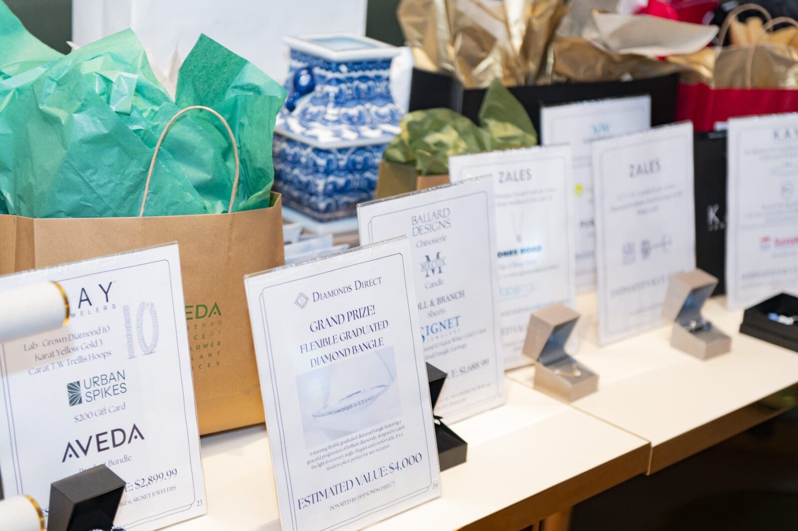 Guests were able to enter into a raffle for over 20 items, including a grand prize diamond bangle from Diamonds Direct. (Photo by Tamytha Cameron Photography)