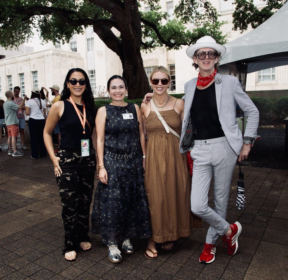 Elizabeth Martin, Michele Leal, emcees Piper Faust and Alton DuLaney at the Orange Show’s 39th Annual Art Car Parade. (Photo by Mike Herrera)