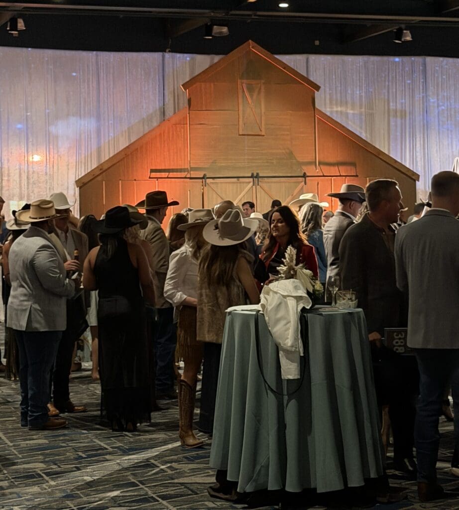 Guests at The Woodlands Christian Academy gala entered through barn doors during Revelry at the Ranch at The Woodlands Waterway Marriott. (Photo by Laura Landsbaum)