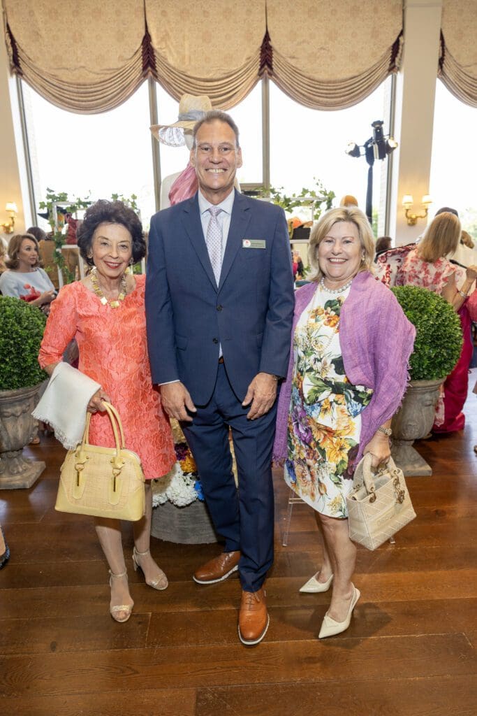 Kathy Goossen, John Romaka, Maureen Higdon at the Salvation Army Auxiliary Reflections on Style luncheon