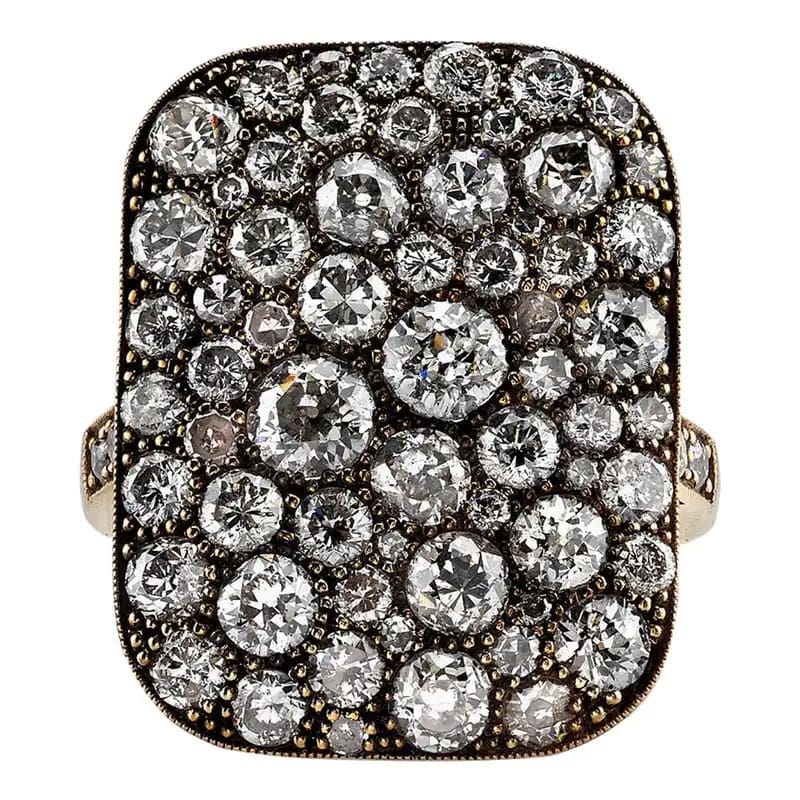 A cobblestone-style ring uses diamonds of varying cuts and sizes arranged in an organic pattern. (Photo courtesy of Single Stone)