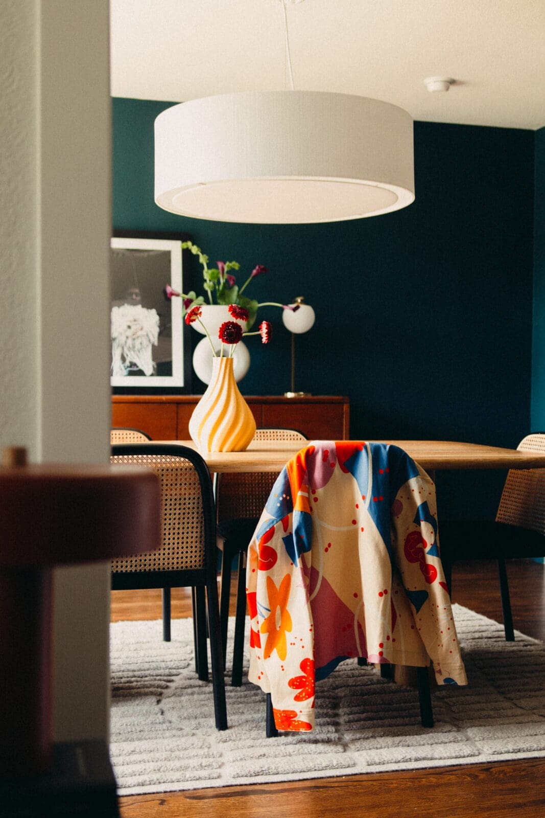 At home, a Coker Studio cardigan over the chair (Photo by James Kung)