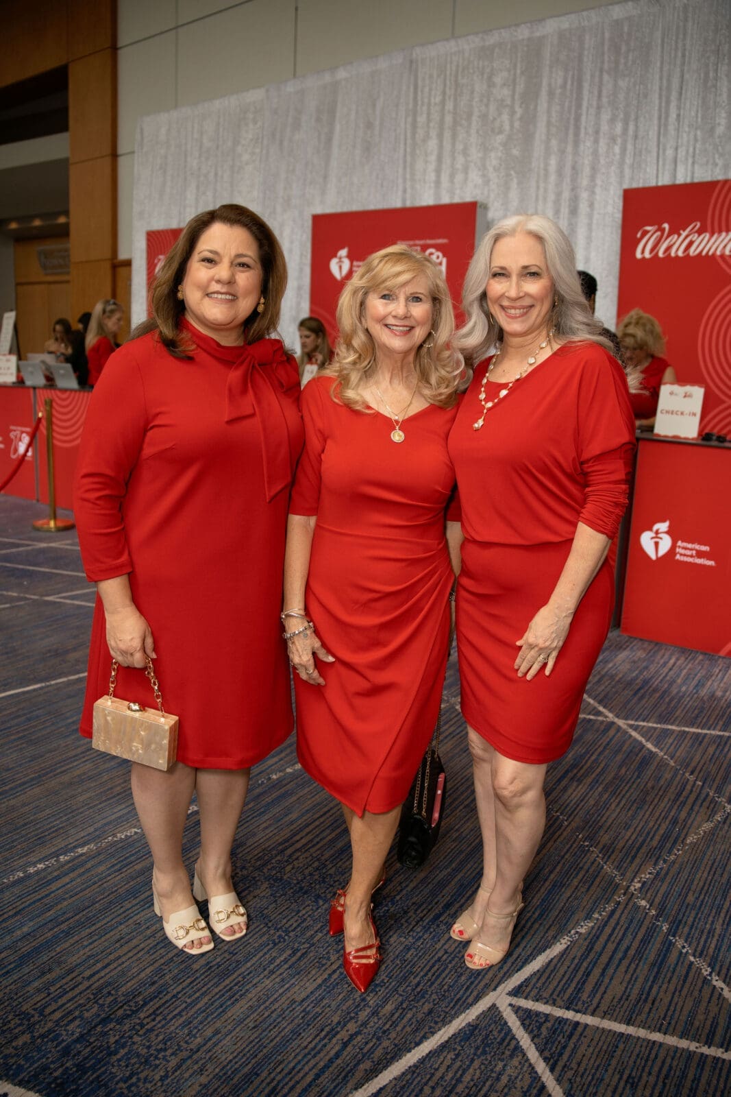 Theresa Wagaman, Maria Holmes and Stacie Coleman at the 2026 Go Red for Women Luncheon. (Photo by 209 Photobooth)