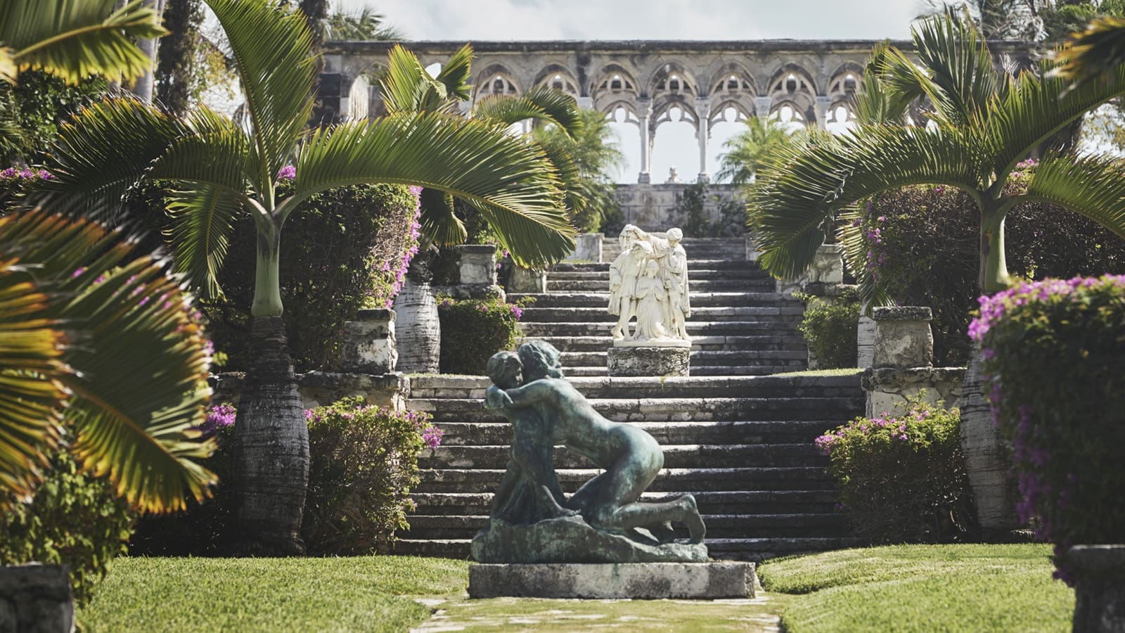 The Versailles Gardens, built by founder Huntington Hartford and still among the most extraordinary outdoor spaces in the Caribbean, cascade toward the sea in seven terraced levels.