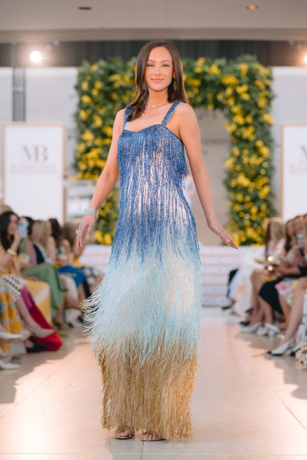 "The Mediterranean Sea" by Mackenzie Brittingham captured the movement of water on the Amalfi coast with cascading beads in aquatic hues. (Photos by Thomas Garza, David Truong, and Rob Wythe/Wythe Portrait Studio)