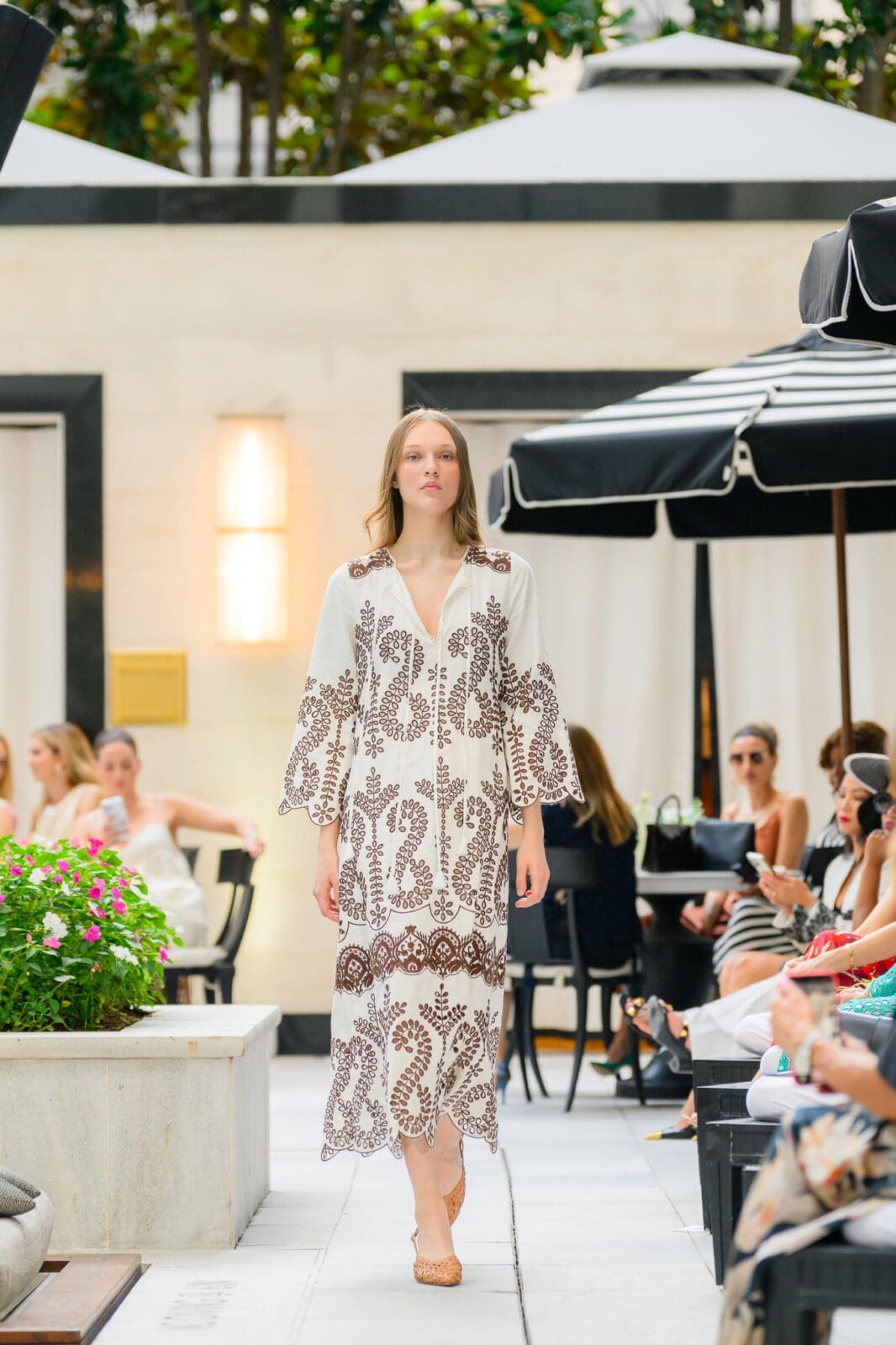 Kaftans are part of the Christy Lynn High Summer 2026 collection on display at the Post Oak Hotel. (Photo by Si Vo)
