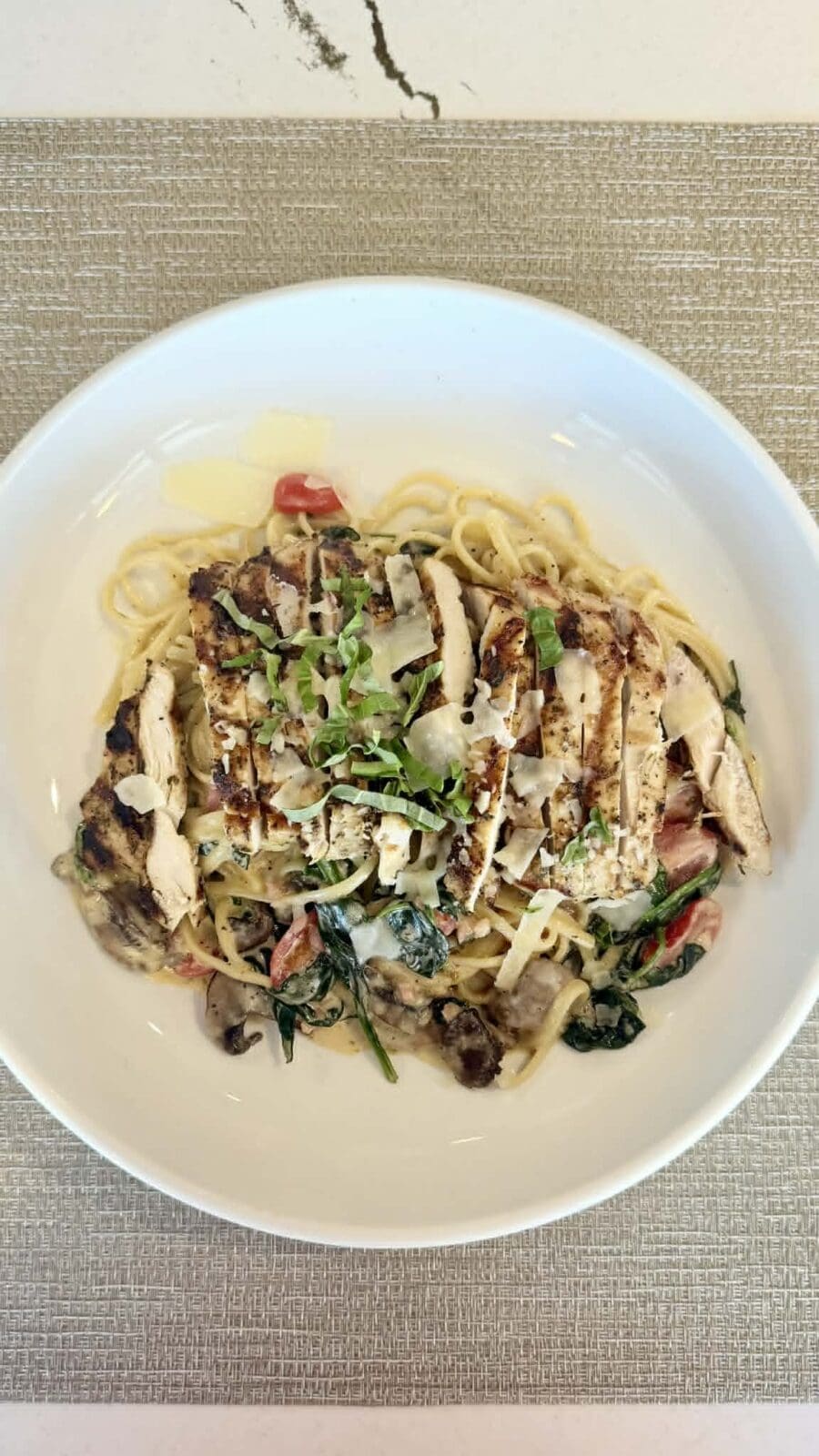 Schilleci’s still offers favorites like this grilled chicken pasta, along with new items listed under the Classics section of the menu.
