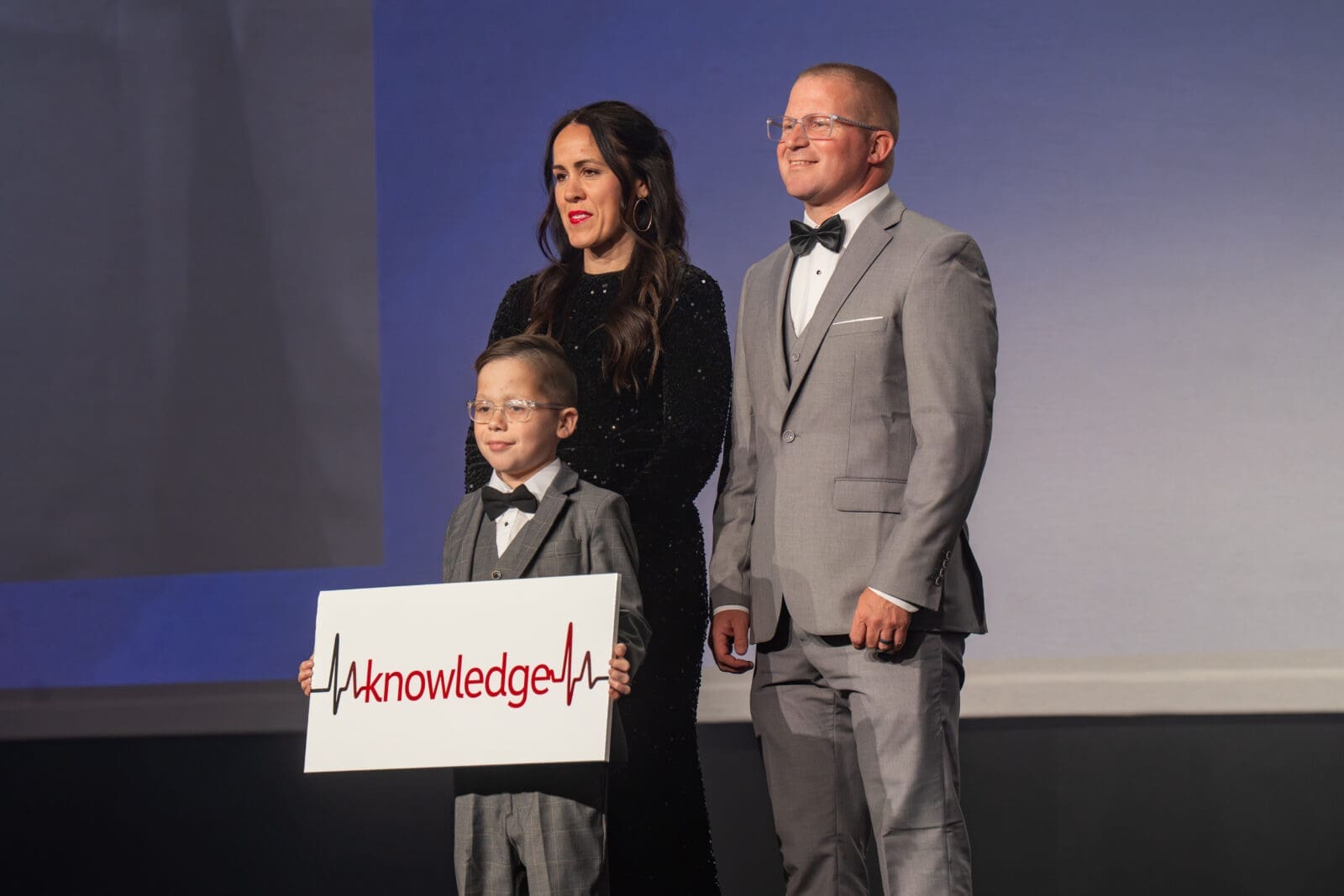 Heart Transplant Survivor Ridge Petersen with his parents, Katie and Tag Petersen. (Photo by See Pink, Inc)