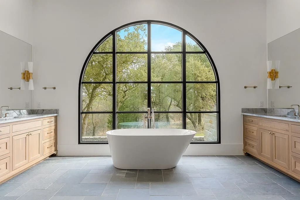 The spacious interiors are accented by modern chandeliers and upscale touches. (Courtesy)