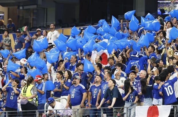 Japan fans cleaning trash World Cup Houston