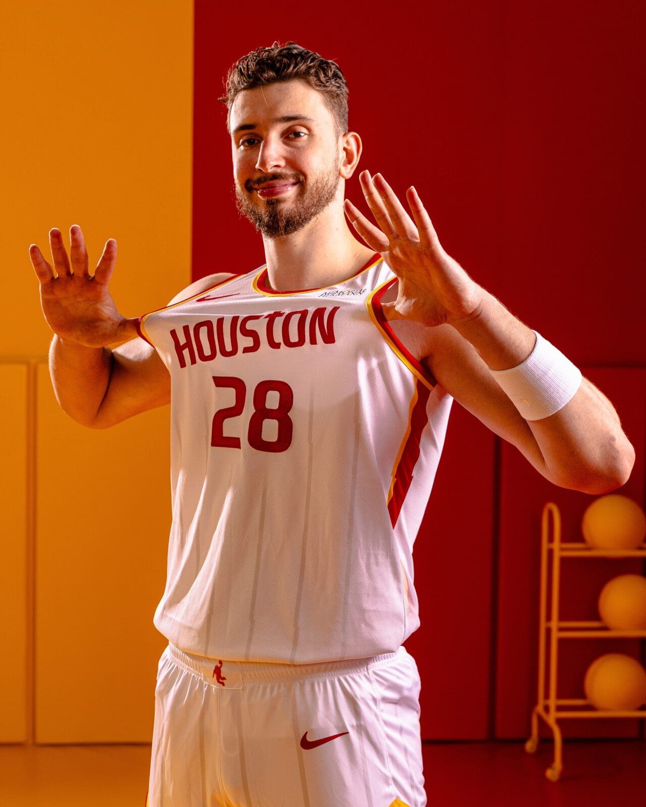 Alperen Şengün shows off the Houston Rockets' new white Association uniform.