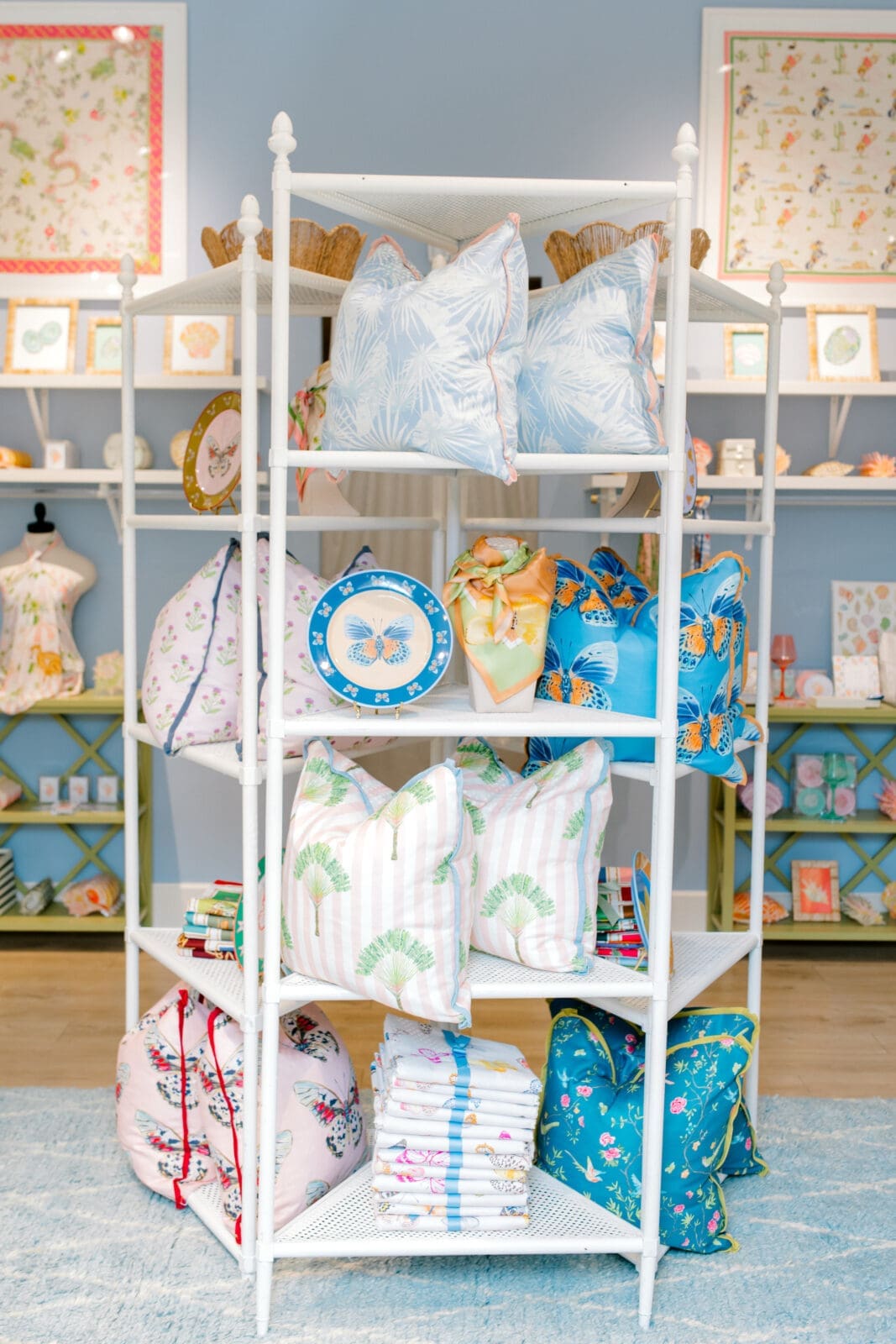 Powder blue walls, pastel accents, and Cartie's watercolor-inspired home décor transform the temporary Clearfork boutique into an immersive extension of her artwork. (Photo by Canon Sawyer)