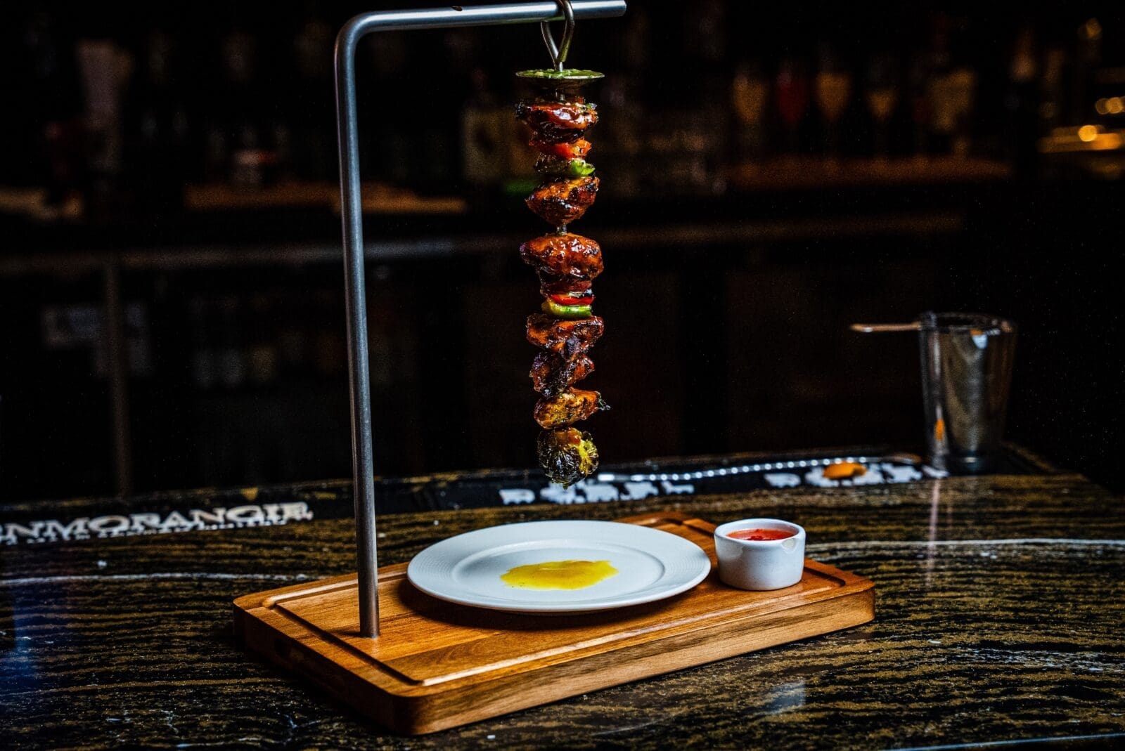 Portuguese Pendurada available in chicken or beef, is prepared as a kabob hung vertically from a pendulum-like stand, brushed with garlic butter. (Photo by Emmanuel Delfin)