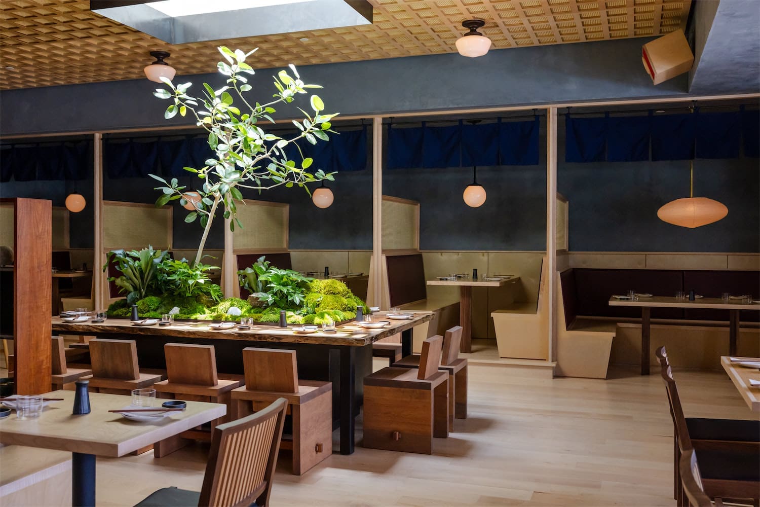 The Dallas outpost boasts the original Neighborhood Sushi aesthetic: "warm, minimalist interiors with subtle Japanese-inspired design elements, creating a tranquil atmosphere ideal for both casual dinners and special nights out. (Photo by Justin Cook)