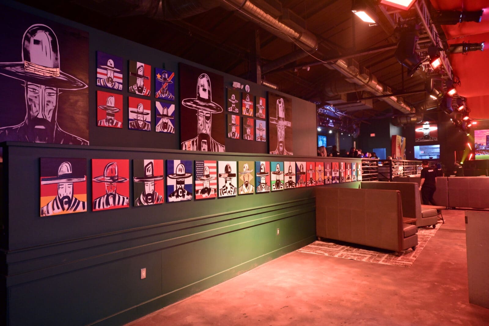 Artwork by Laura Goodson lines the walls of The Ranch Presents Pitch Live. (Photo by Alex Montoya) 
