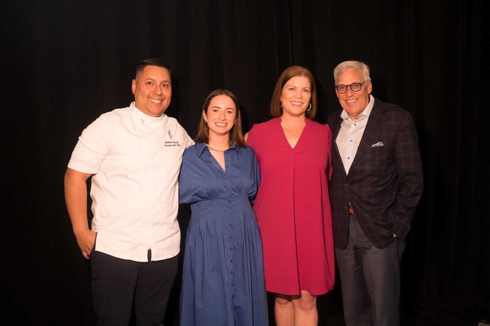 Four Seasons Executive Chef Jonathan Esparza, Claire Richardson, Lauren Levicki Courville, Four Seasons Hotel GM Tom Segesta at Dress for Success Houston's PowHER Hour wine dinner (Photo by Daniel Ortiz)