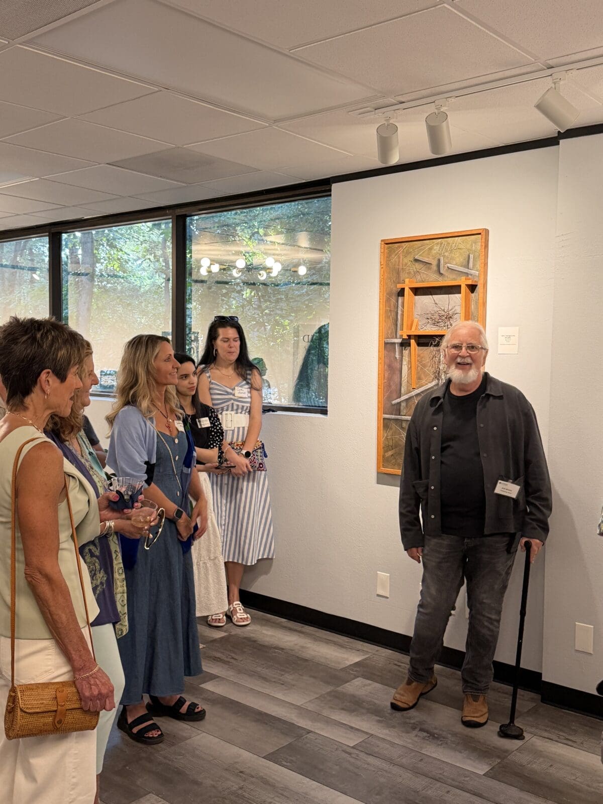 Exhibiting Artist Bob Mosier shares about how he created his artwork. (Photo courtesy of The Woodlands Art Council)