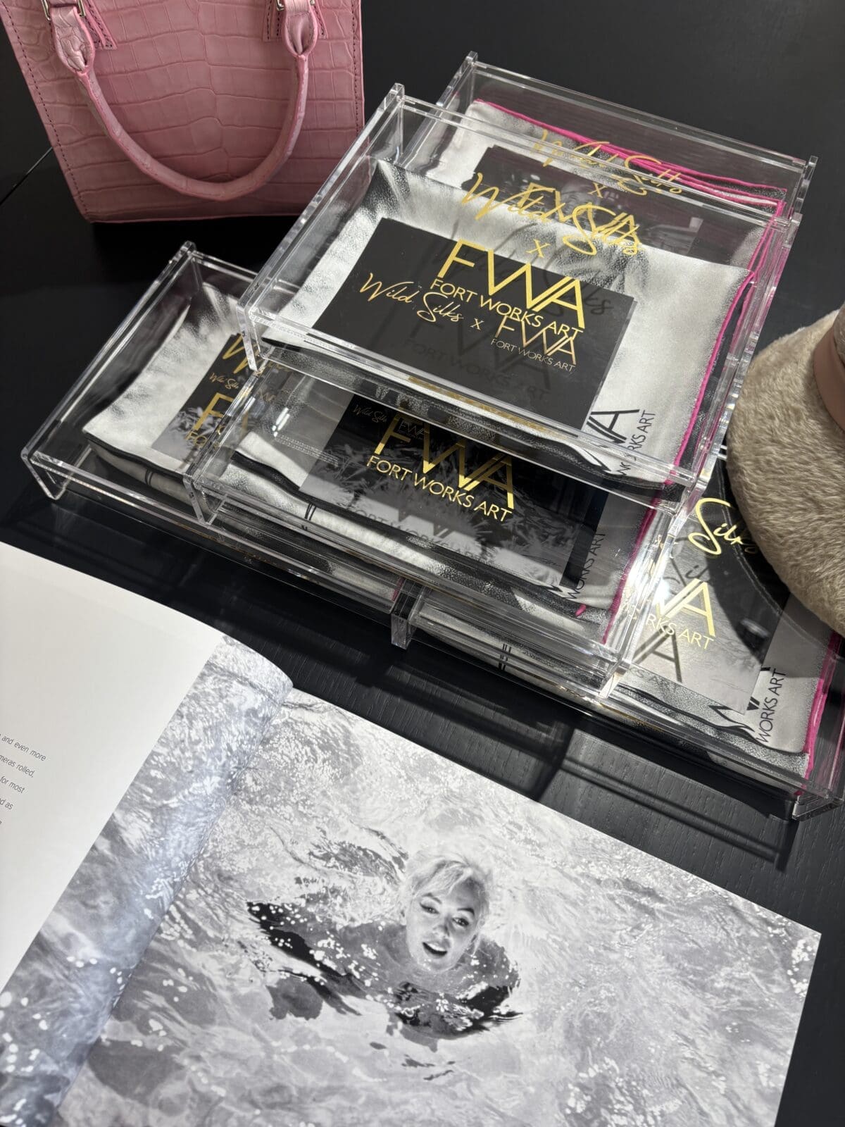 Wild Silks created a limited-edition silk scarf featuring Lawrence Schiller's photograph of Marilyn Monroe swimming during the filming of Something's Got to Give. (Courtesy)