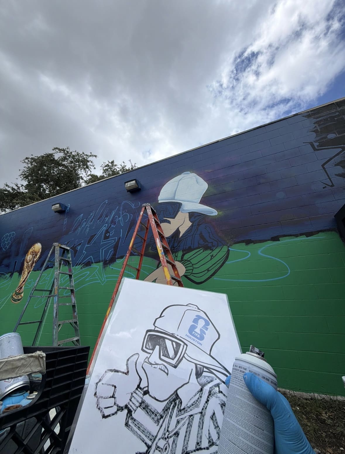 A detail of artist Sebastien "Mr. D 1987" Boileau's mural "The Bayou-tiful Game," 2026, which appears at 2415 Main Street, Houston. (Photo by Eyeful Art)