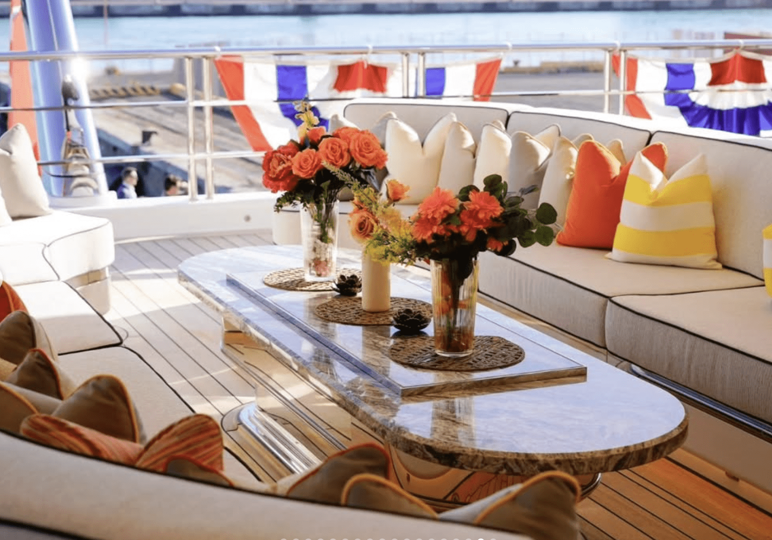 An open air deck on  Ambassador Tilman Fertitta's Boardwalk which is patriotically dressed for the Freedom 250 tour. (Instagram photo)