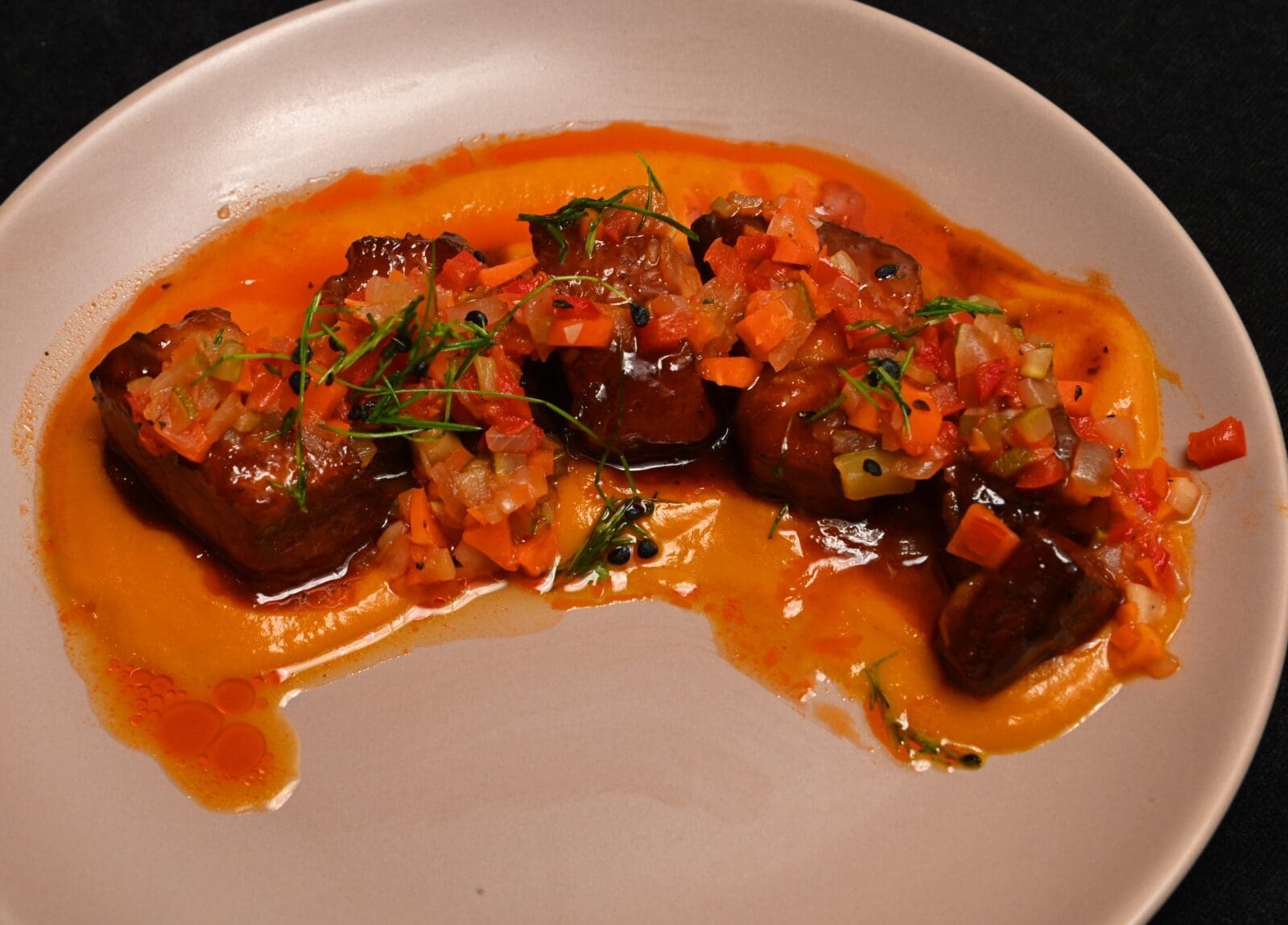 Second-place winner Chef Paul Friedman of The Chef’s Table earned a $750 cash prize for his Sticky Pork Belly. (Photo courtesy Food & Vine Time Productions)
