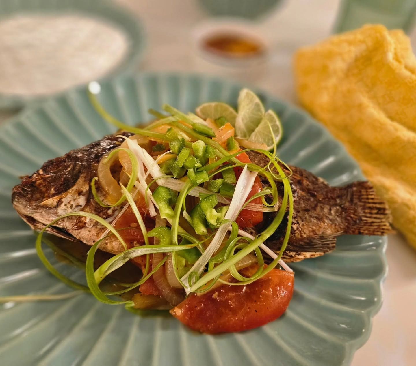 Ca Sot Ca, a whole fried garlic and lemongrass fish topped with a rich, spicy tomato sauce, will be among the signature dishes on the menu at Duong DeVille. (Courtesy)