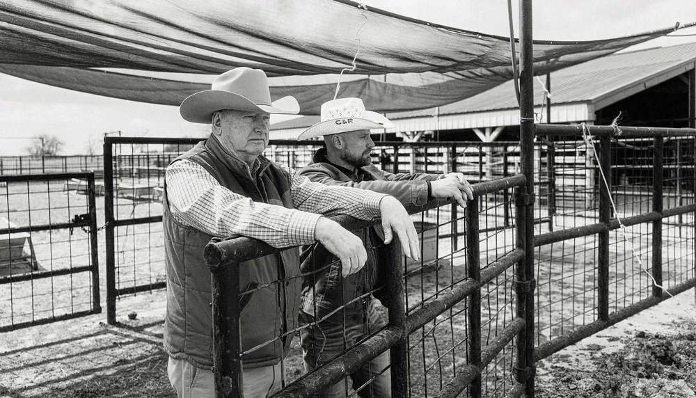 Rancher Larry Ludeke (left) with Simmons at the ranch. (Photo courtesy of Charolais)