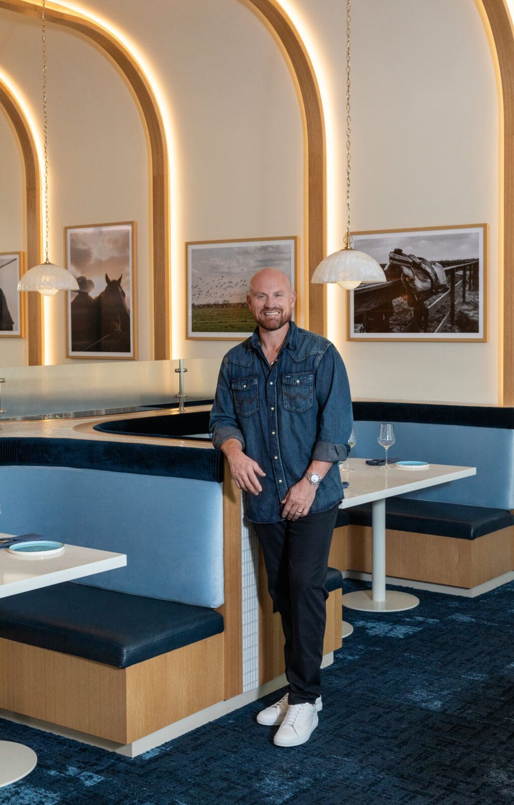 Chef Austin Simmons in his newest restaurant, Charolais. (Photo courtesy of Howard Hughes)