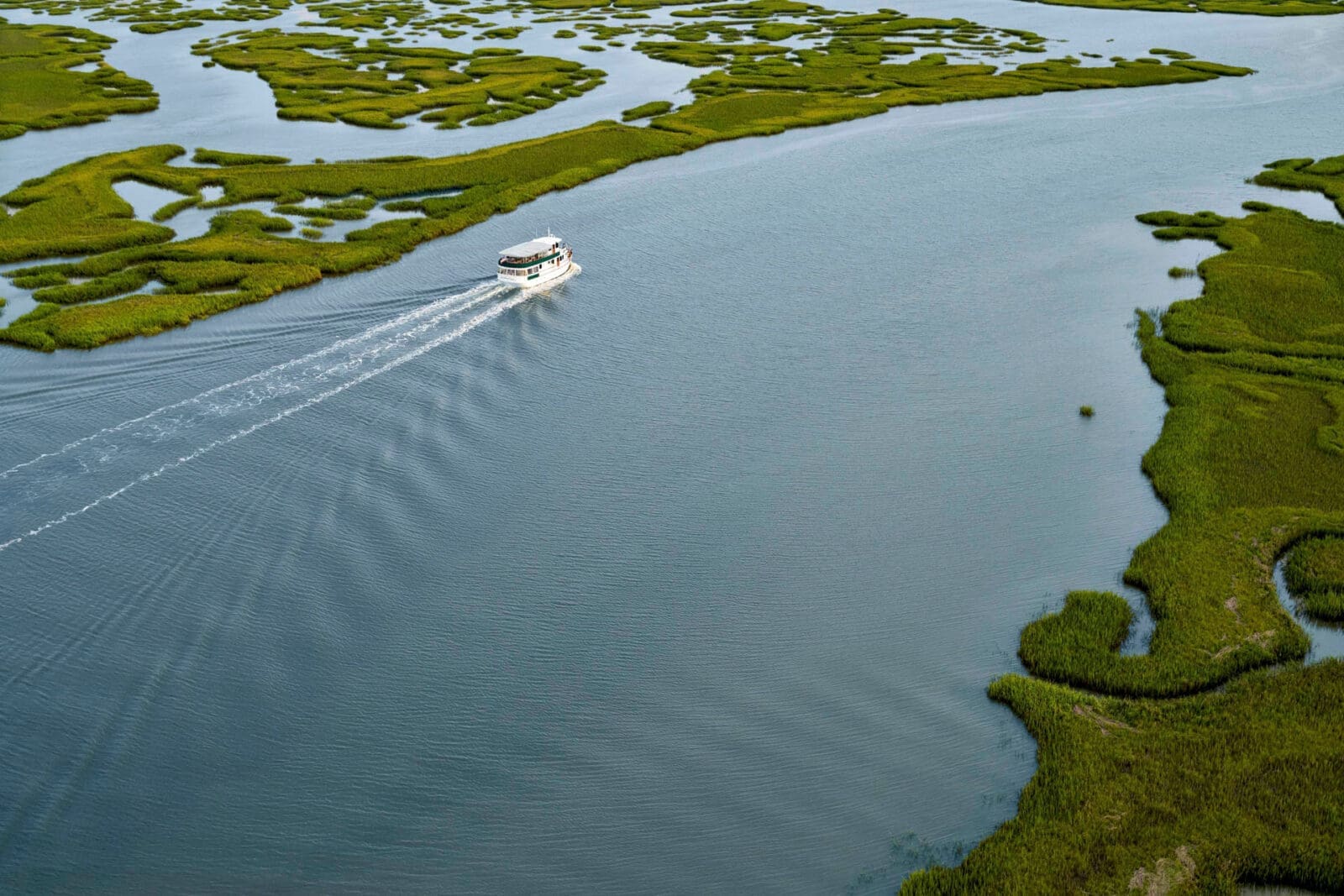 Sea Island offers a robust selection of activities and excursions, including a yacht cruise along the marsh. (Photo by Sea Island)
