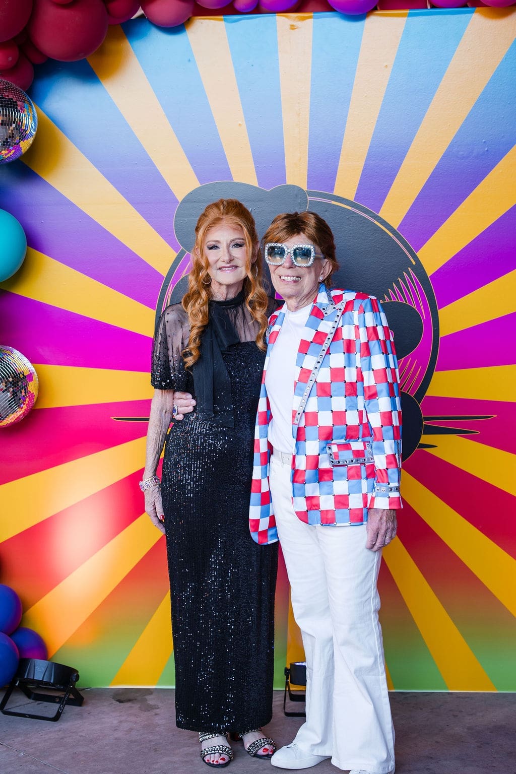 Party hosts Jane Howze & John Mann at the rock concert-themed birthday bash in Park City, Utah. (Photo by Sparkle Photography)