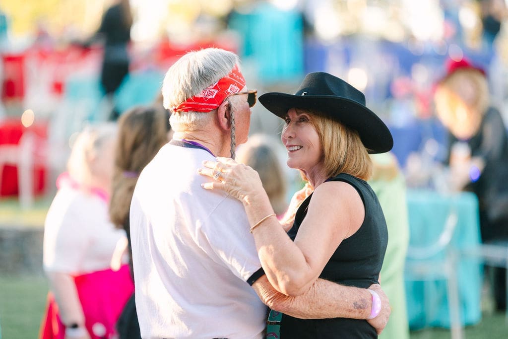 Gordon & Laura Menard at the rock concert-themed birthday party. (Photo by Sparkle Photography)