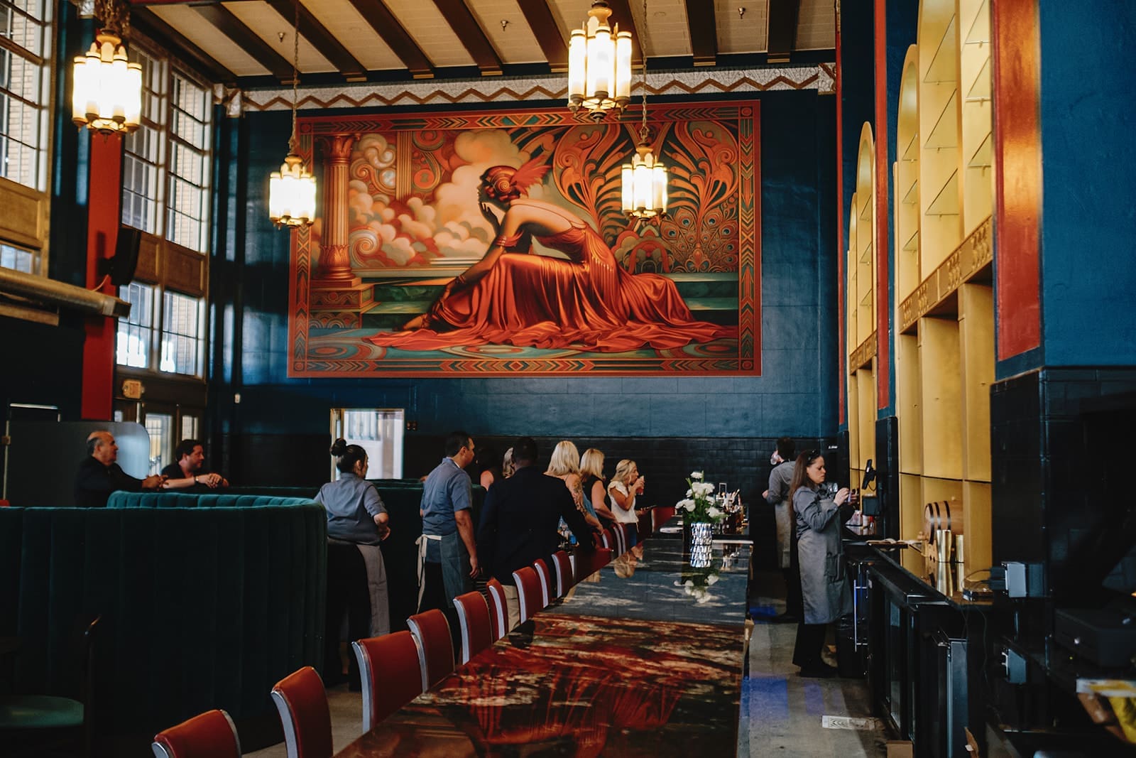 Painted along the west wall, Station & Vine's muse sits in repose, her dress spilling across the floor. (Photo by Chancee Proctor and Teshorn Jackson )
